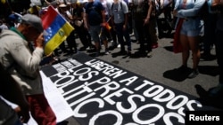 Manifestantes se reúnen el día de una marcha convocada por la líder opositora venezolana María Corina Machado REUTERS/Leonardo Fernández Viloria