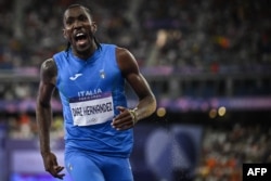 Andy Díaz Hernández en la final masculina de triple salto del evento de atletismo en los Juegos Olímpicos de París 2024 en el Stade de France en Saint-Denis, al norte de París, el 9 de agosto de 2024. (Foto de Ben STANSALL / AFP)