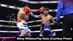 Robeisy Ramírez perdió por nocaut técnico frente a Rafael "Divino" Espinoza. (Cortesía: Mikey Williams/Top Rank)